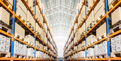 Rows of shelves with boxes in modern warehouse