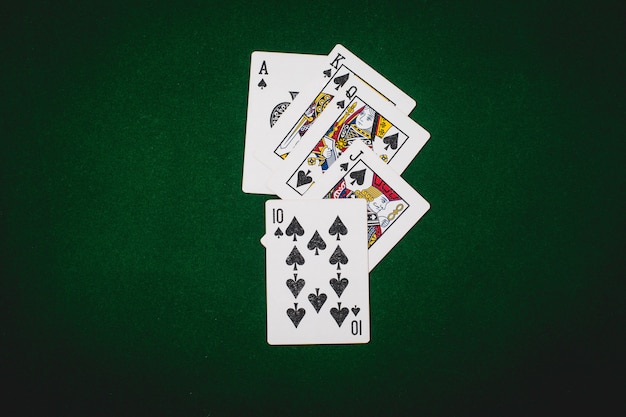 Royal Flush on green background