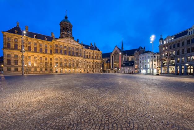 The royal palace in dam square at amsterdam, netherlands. dam square is famous place in amsterdam