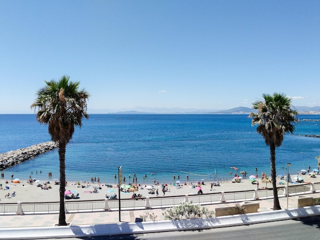 Royal walls of Ceuta coastal tourist city in Spain with beach and sun