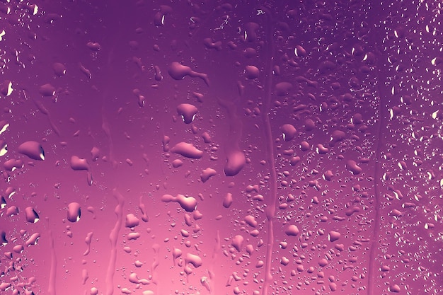 roze achtergrond druppels glas abstracte textuur