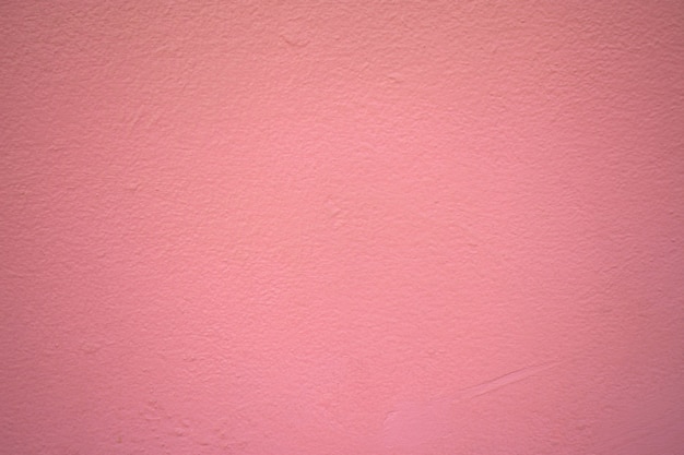 Foto roze betonnen muur textuur achtergrond.