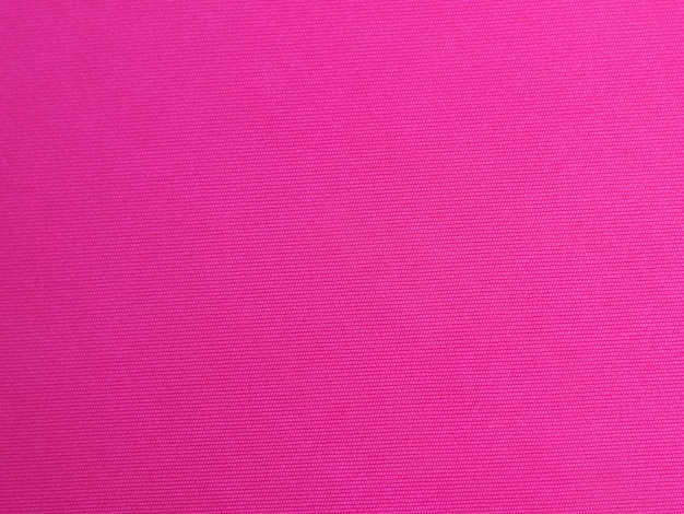 Roze fluwelen stof textuur gebruikt als achtergrond Lege roze stof achtergrond van zacht en glad textielmateriaal Er is ruimte voor textxD