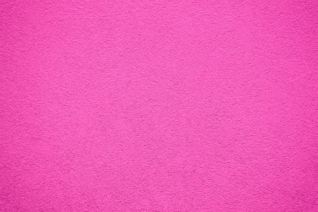 Roze geschilderde muur. Oude gekleurde stenen muur textuur.