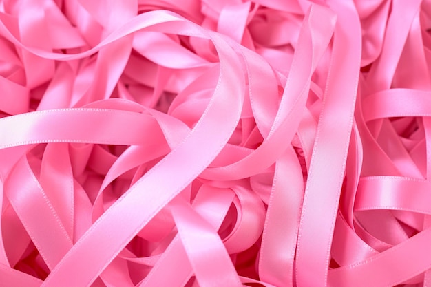 Foto roze oktober verscheidenheid aan roze linten die elk een verhaal vertellen over hoop en moed in de strijd tegen borstkanker