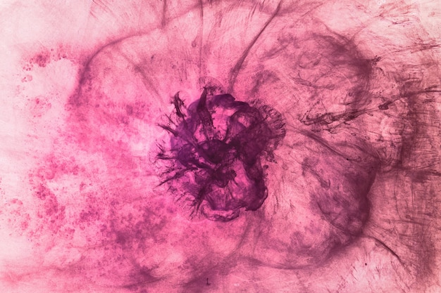 Roze paarse explosie abstracte achtergrond. violette kleur kosmische ruimte, wervelende acryl in waterbehang, kersen- en rozengeurconcept