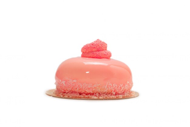 Roze pudding op een gouden doos