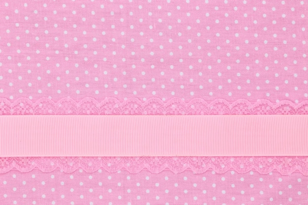 Roze retro polka dot textiel achtergrond