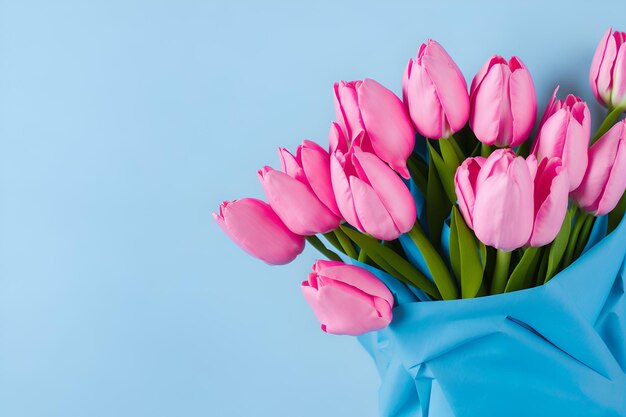 Roze tulpenbloemen op een blauwe achtergrond