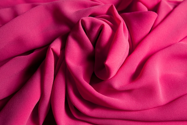 roze verfrommeld chiffon stof. stof achtergrond