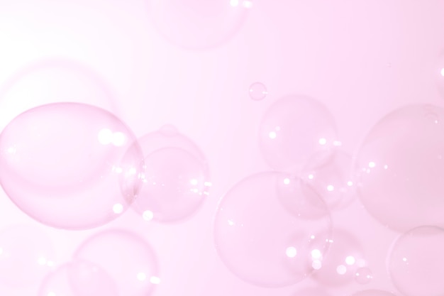 roze zeepbellen zweven achtergrond