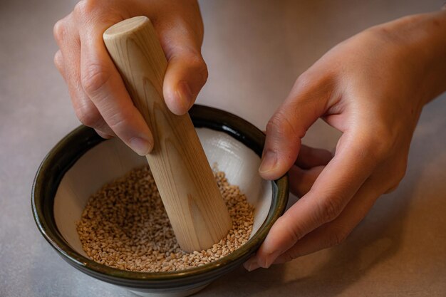 Rub sesame seeds