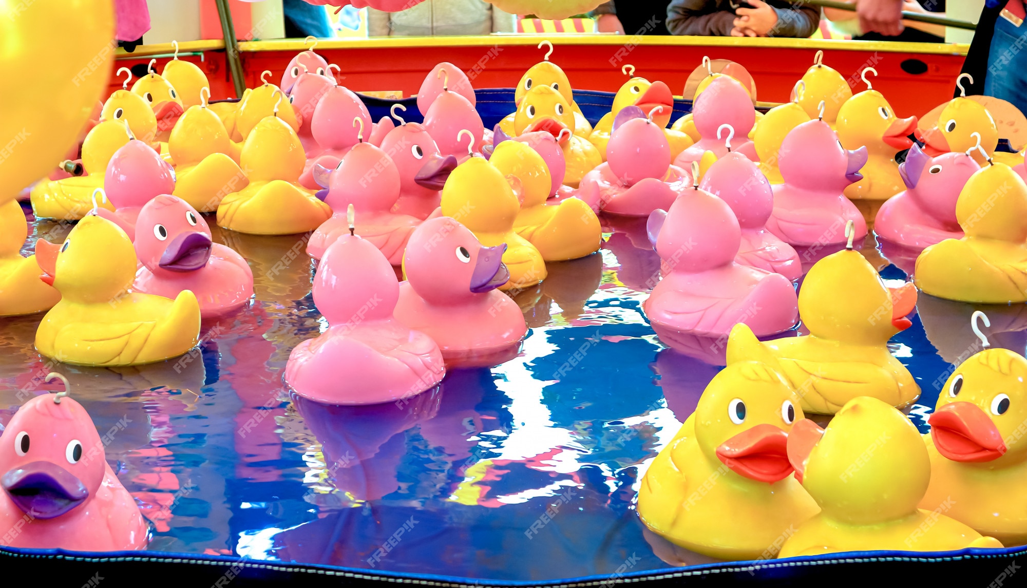 Premium Photo | Rubber duck fishing game.