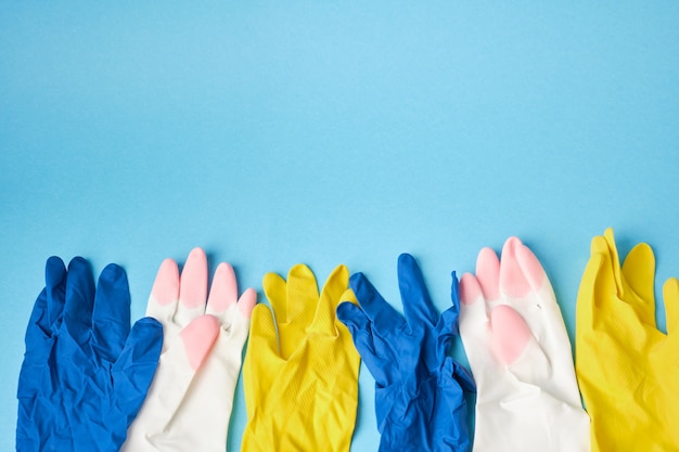 Rubber gloves on blue nackground