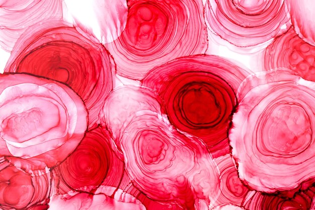 Ruby pink ink abstract background marble texture fluid art pattern wallpaper paint mix underwater wavy spots and stains