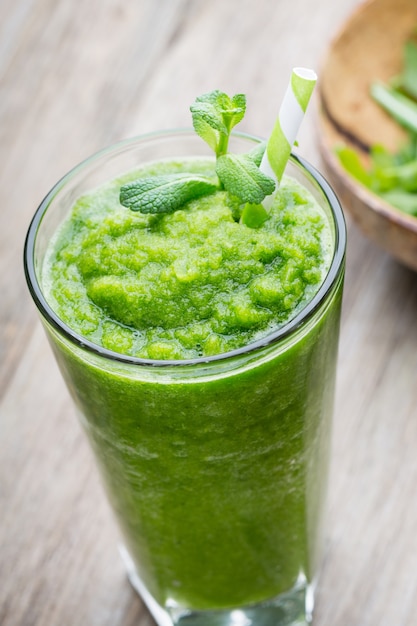 Rucola smoothie, on the grey  table