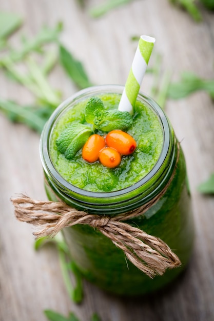 Rucola smoothie, on the grey table