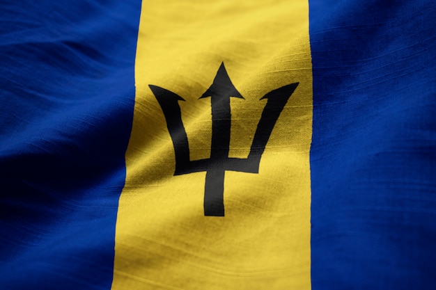 Photo ruffled flag of barbados blowing in wind