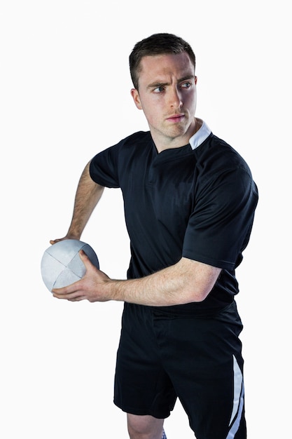 Rugby player about to throw a rugby ball