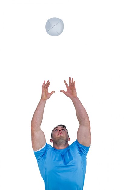 Photo rugby player catching the ball