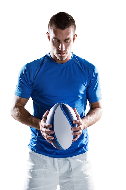 Rugby player holding ball