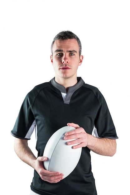 Photo rugby player holding a rugby ball