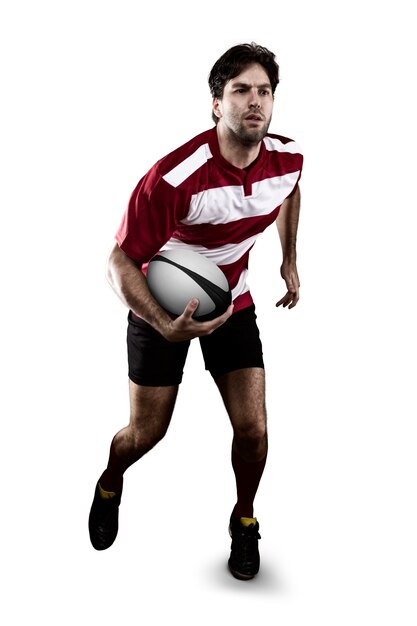 Rugby player in a red uniform running.