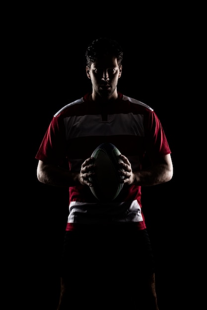 Rugby player in a red uniform.