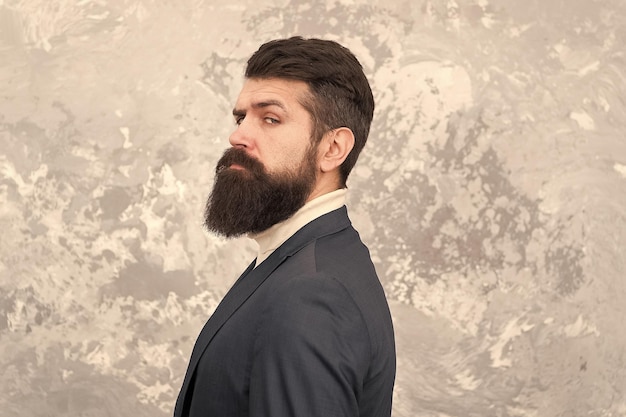 Rugged and manly Tailor or fashion designer Modern life Brutal bearded hipster in formal suit elegant man with beard Male fashion model Mature businessman Beard grooming Bearded and stylish