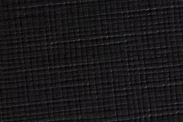 Rugged wrinkled black paper background