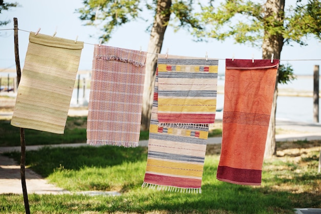 Rugs hanging on a rope