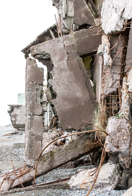 Ruined house on the sand near the sea.