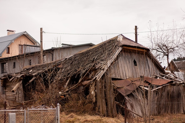 a ruined old wooden village house