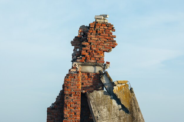 ruined structure against the blue sky