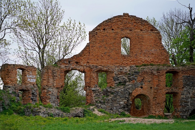 Ruins of an ancient castle ukraine Ruins of expressive red brick gate tower of ancient castle in Korets Ukraine