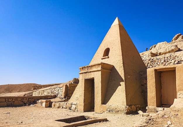 Ruins of ancient Deir elMedina one of the group of Theban necropolises