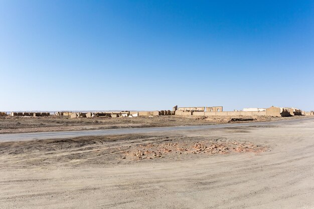 The ruins background of an abandoned town on cold lake oil base haixi mongolian and tibetan autonomous prefecture qinghai province China