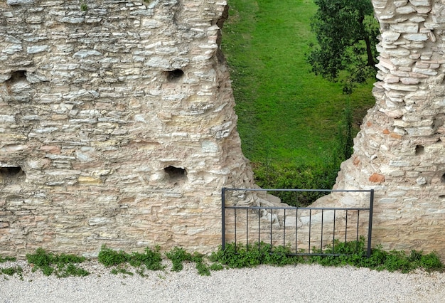 Ruins of roman villa grottoes of catullus in sirmione at lake garda in itlay in the summer