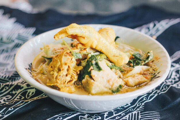 Rujak Soto is a typical cuisine or traditional food from the Banyuwangi area East Java Indonesia This dish is a unique blend of vegetable salad or rujak with soto from Indonesia