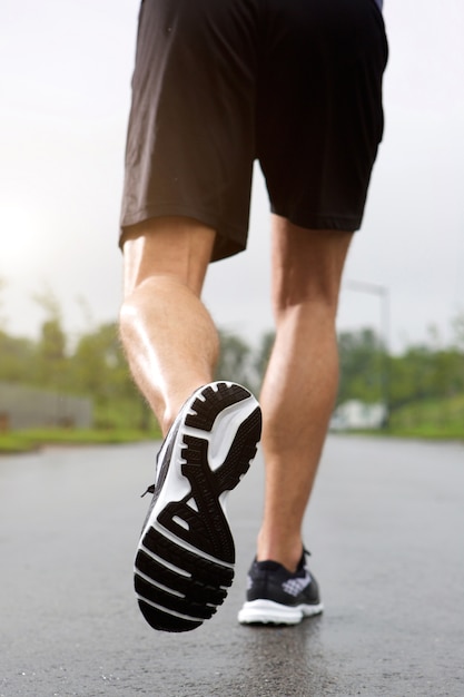 Photo runner wearing sneakers and shorts