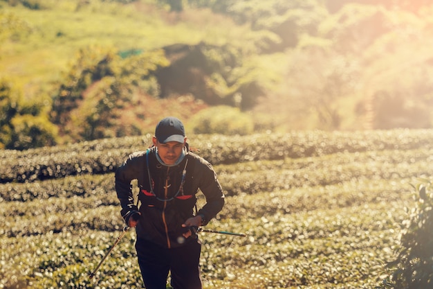 Photo runners. young people  trail running on a mountain path. adventure trail running on a mountainlifestyle.