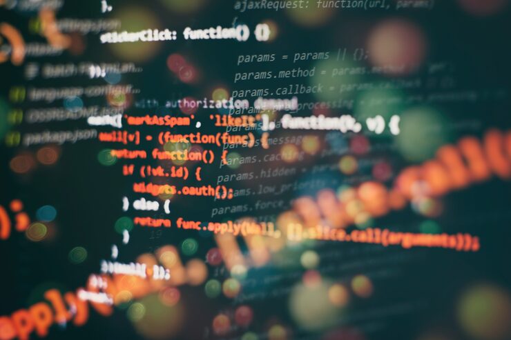 Photo running computer data / www programming. coding script text on screen. notebook closeup photo.