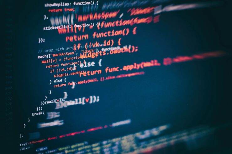 Photo running computer data / www programming. coding script text on screen. notebook closeup photo.