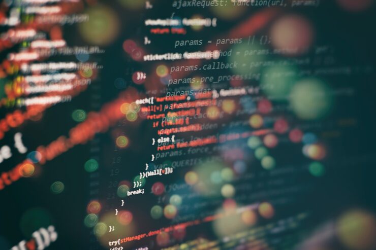 Photo running computer data / www programming. coding script text on screen. notebook closeup photo.