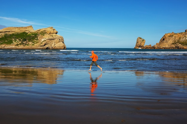 Running man in ocean coast