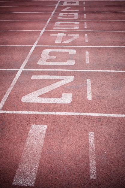 Photo running track in sport stadium.