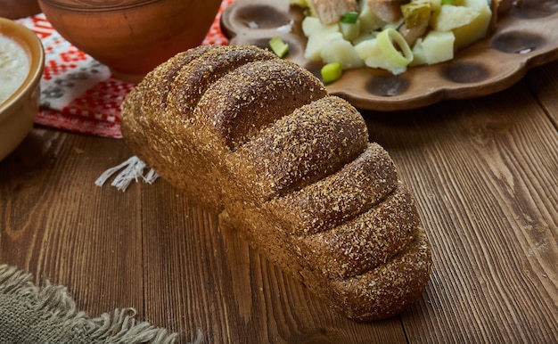 Rupjmaize,  traditional dark bread , Latvian cuisine, Traditional assorted dishes, Top view.