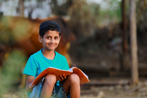 Rural Indian Child  studying at home