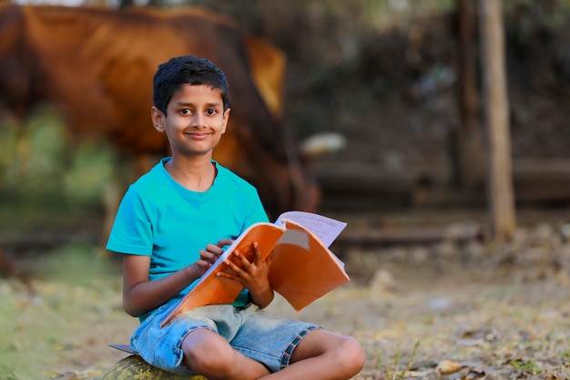 Rural Indian Child  studying at home