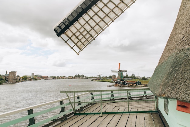 Rural landscape with windmill in Zaanse Schans Holland Netherlands Authentic Zaandam mill